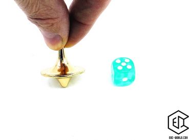 Gimmick-Set: Kreisel gold glänzend mit grünem Würfel