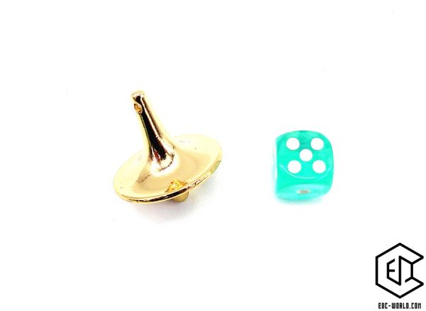 Gimmick-Set: Kreisel gold glänzend mit grünem Würfel